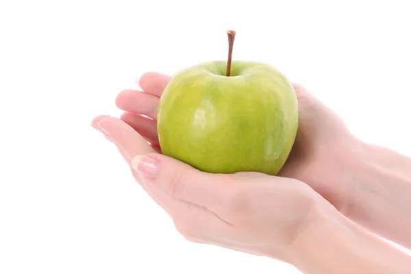 Färskt grönt äpple i händer — Stockfoto