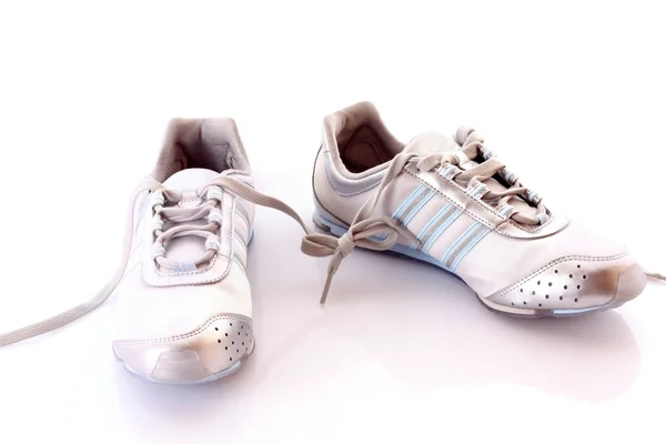 Zapatos para correr sobre fondo blanco — Foto de Stock