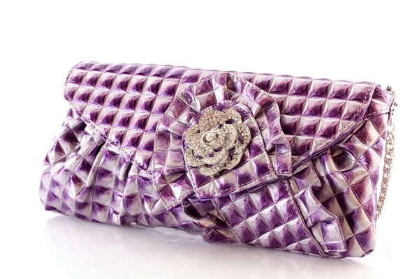 Bolsa violeta no fundo branco — Fotografia de Stock