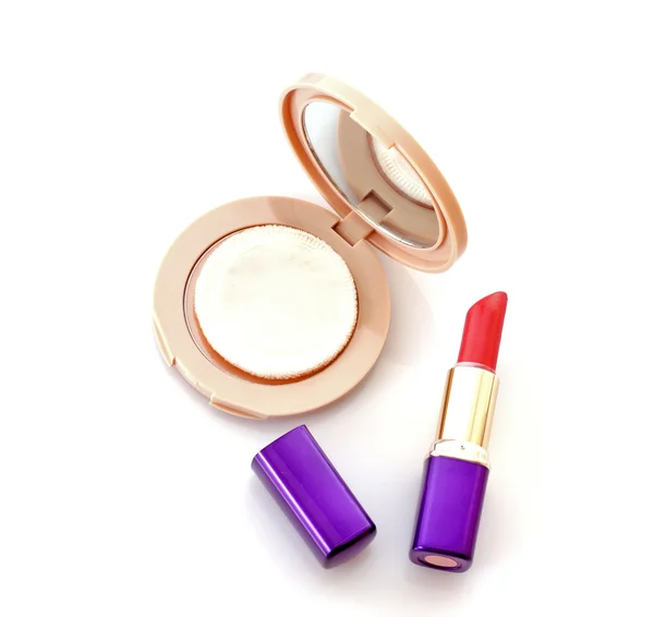 stock image Face powder and lipstick on white