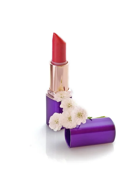 Lipstick and flower — Stock Photo, Image