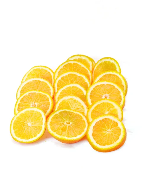 Many sliced oranges — Stock Photo, Image