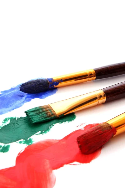 Pincéis na pintura a cores — Fotografia de Stock
