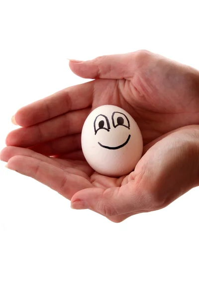 Uovo con il sorriso in mano — Foto Stock