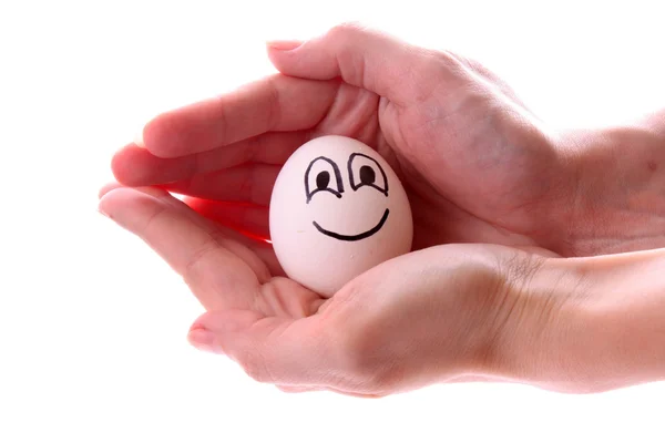 Αυγό με χαμόγελο στο χέρι — Φωτογραφία Αρχείου