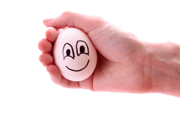 Uovo con il sorriso in mano — Foto Stock
