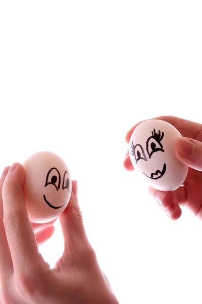 卵 3 個を白で隔離される手 — ストック写真