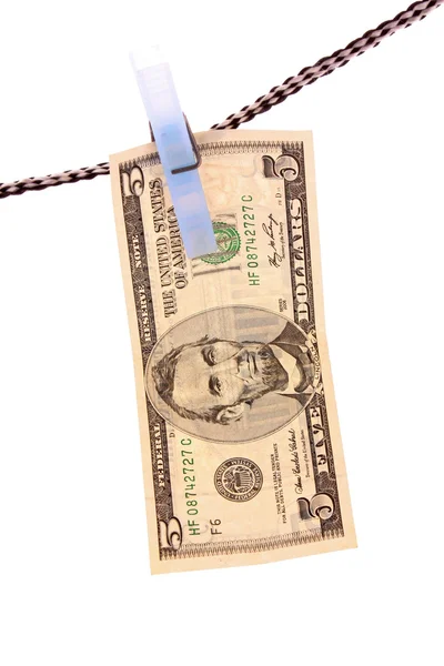 Dolar nad bílým pozadím — Stock fotografie