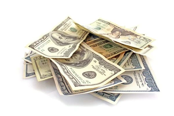 Dólares em fundo branco — Fotografia de Stock