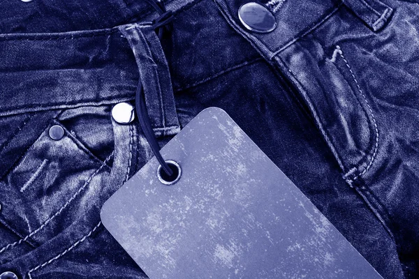 Blank leather label for text on jeans — Stock Photo, Image