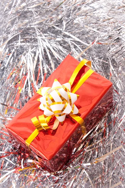 Christmas balls among silver glittering decoration — Stock Photo, Image