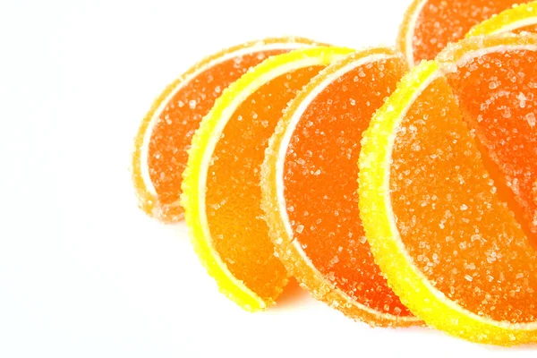 Peu de gelée de fruits de citron tranchée isolée sur blanc — Photo