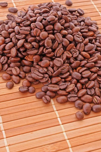 Coffee grains on brown background — Stock Photo, Image
