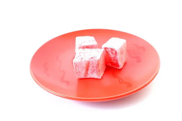 Turkish delight (lokum) confection on a white dessert plate — Stock Photo, Image