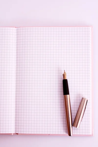 Note pad with pen — Stock Photo, Image