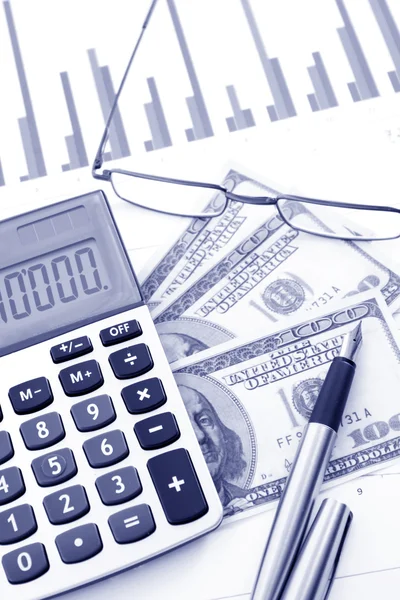 Calculate money with the calculator Stock Image