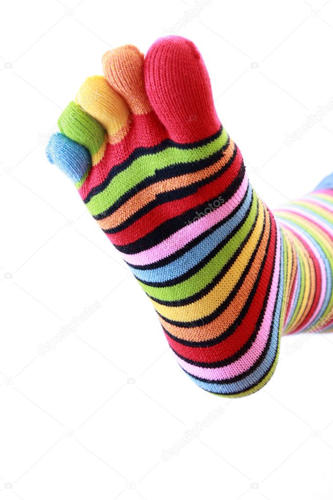 Woman legs in strip sock on white background