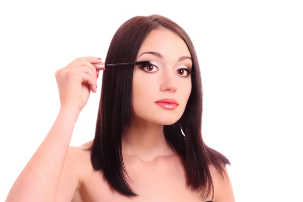 Beautiful young woman with mascara brush — Stock Photo, Image