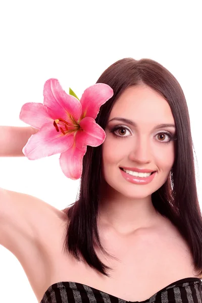 Zambak çiçekli güzel genç bir kadın — Stok fotoğraf