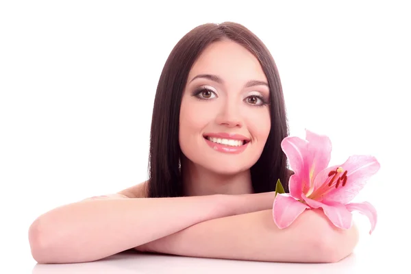 Piękna młoda kobieta z kwiatem lilii — Zdjęcie stockowe