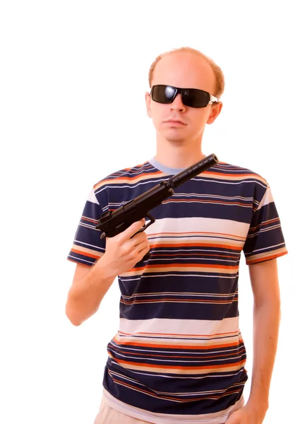 Young man with gun isolated — Stock Photo, Image