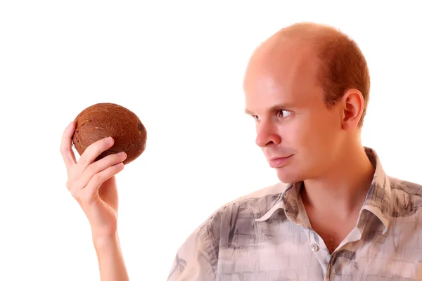 Jonge man met kokos geïsoleerd op wit — Stockfoto