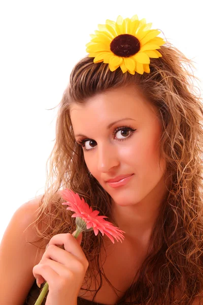 Happy woman with sunflower in hair isolated on white — Stock Photo, Image