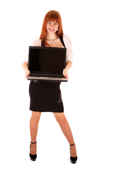 A gazdaság egy nyitott laptop mint Pünkösd boldog aranyos női portré — Stock Fotó