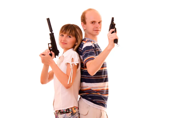 Mulher e homem com armas sobre branco — Fotografia de Stock