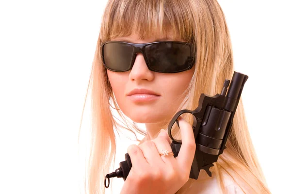 Sexig kvinna med pistol över vita — Stockfoto