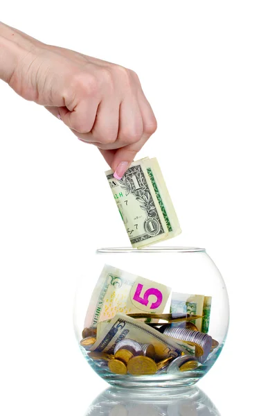 Glas bank voor tips met geld en hand geïsoleerd op wit — Stockfoto