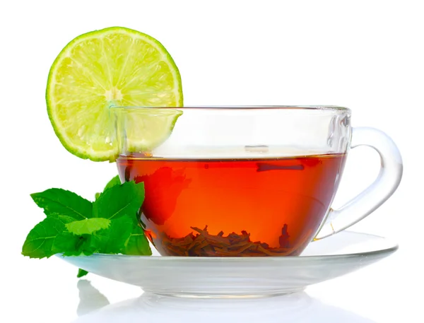 Zwarte thee in cup, munt en limoen — Stockfoto
