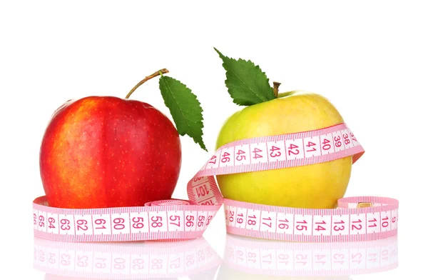 Два яблока и измерительная лента — стоковое фото