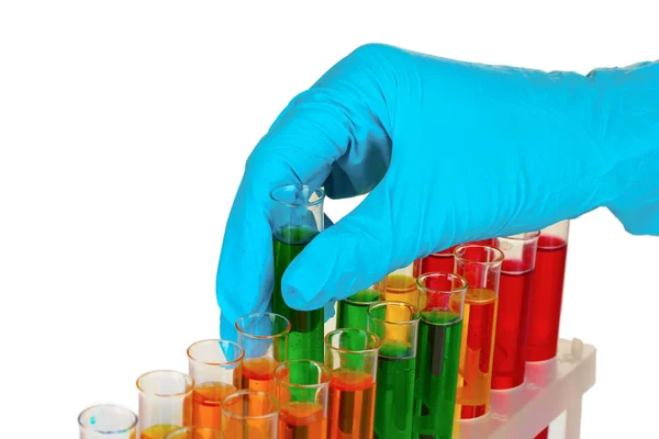 Test tubes and hand in laboratory — Stock Photo, Image