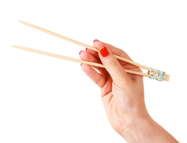 女人的手和木制筷子 — 图库照片
