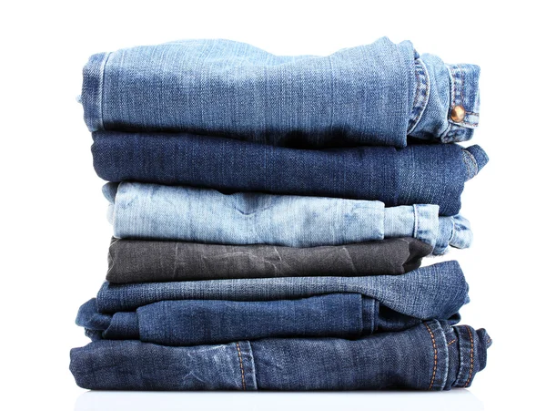 Lot of blue jeans — Stock Photo, Image