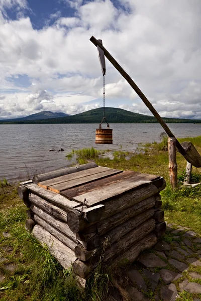 stock image Old wooden draw-well