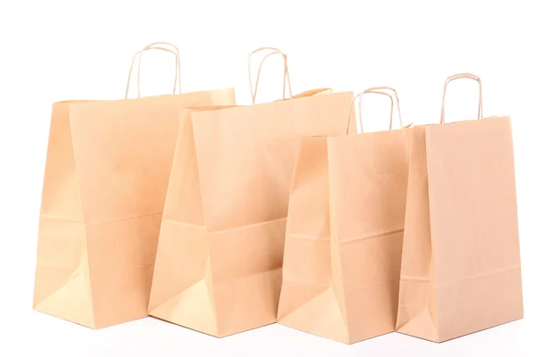 Compras sacos de presente marrom isolado — Fotografia de Stock