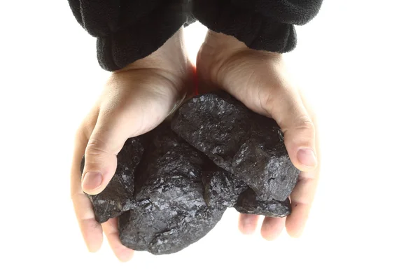 Pieces of coal in hand isolated — Stock Photo, Image