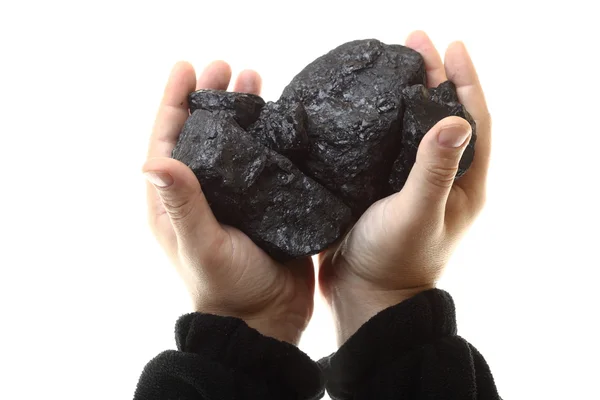 Kohlestücke in der Hand isoliert — Stockfoto