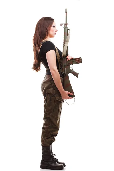 Γυναίκα του στρατού με όπλο - όμορφη γυναίκα με πλαστικό τουφέκι — Φωτογραφία Αρχείου