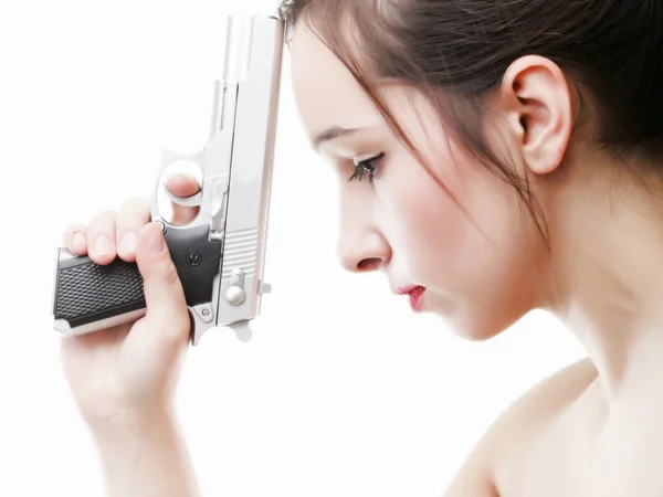 Sexy giovane donna pistola isolata su bianco — Foto Stock