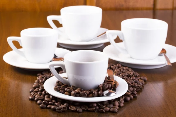 Quatro xícaras de café expresso — Fotografia de Stock