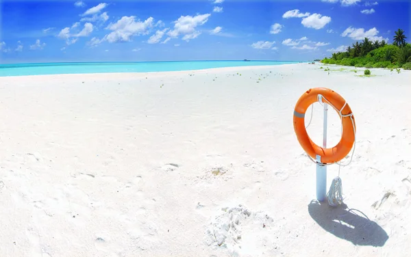 Tropical beach and lifebuoy panorama — Stock Photo, Image