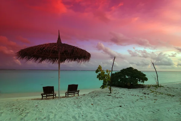 Umbrella and sunset — Stock Photo, Image