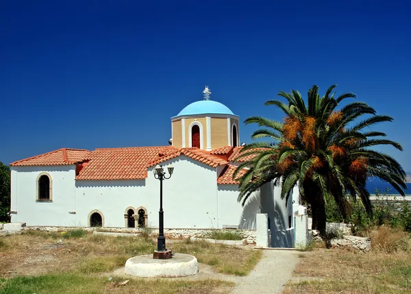 Igreja grega e palma — Fotografia de Stock