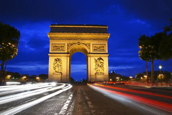 Triumph arch's nachts — Stockfoto