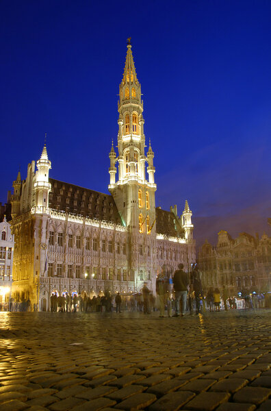 Grand Place Grote Markt at night in Brussels with crowds of , Belgium