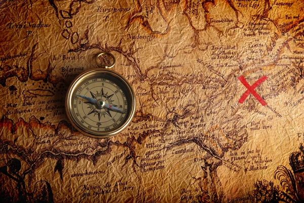 Compass and a map Royalty Free Stock Photos