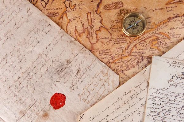 Compass and a map — Stock Photo, Image